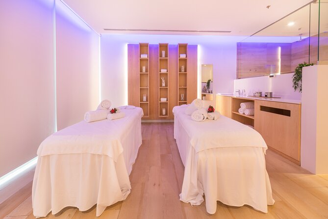 25 Minute Couples Massage with Spa Access - Moving Through the Pool, Hydro Massage, and Heat Rooms