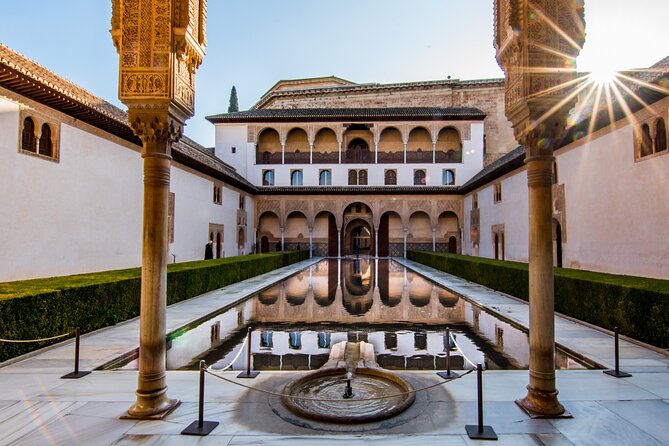 Alhambra Tour and Nazaries Palaces with Hammam Massage Experience - The Nasrid Palaces and the art of looking up