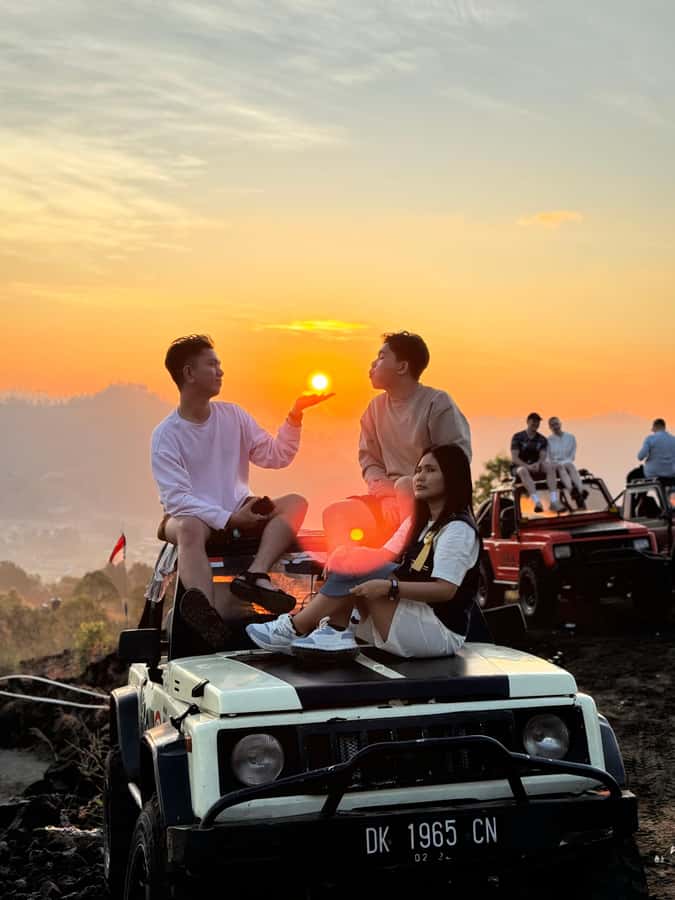 Bali: Mount batur jeep sunrise & natural hot springs - Sunrise from the volcanic slope