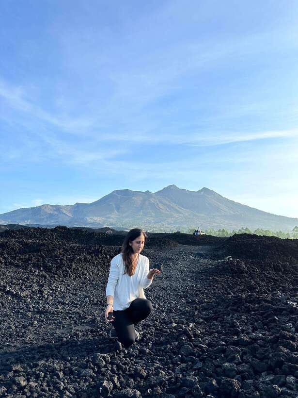 Bali: Sunset Mount Batur Jeep and Hot Spring All Inclusive - Black lava from Mount Batur’s eruptions
