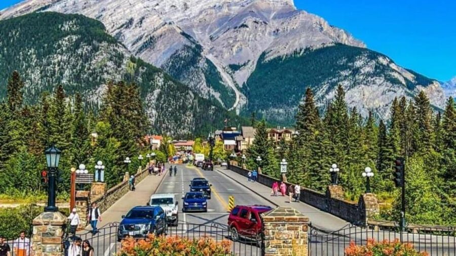 Banff: Gondola, Hot Springs, Bow falls & Three lakes tour - Banff Avenue gives the day a change of pace