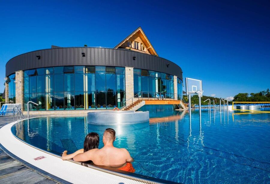 From Krakow: Chochołowskie Thermal Baths Ticket and Transfer - Hydromassage, geysers, bars, and the family areas
