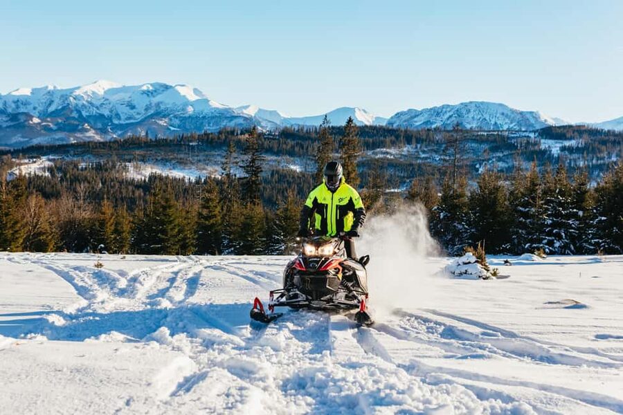 From Krakow: Snowmobile Adventure with Thermal Pools Visit - Group size, comfort, and guide quality