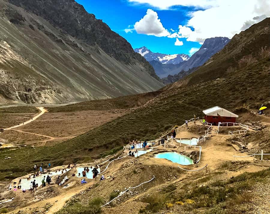 From Santiago: Maipo Canyon Volcano and Hot Spring Tour - The volcano walk and its changing mountain colors