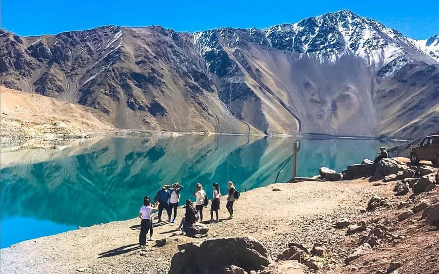 Full-Day Embalse del Yeso & Hot Springs Tour from Santiago - A cheese platter with Chilean wine