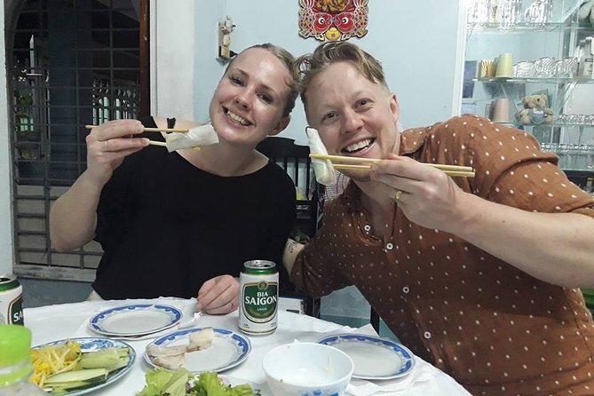 Hoi An By Night with Boat Trip and Foot Massage - Hoi An’s night market and street food stops