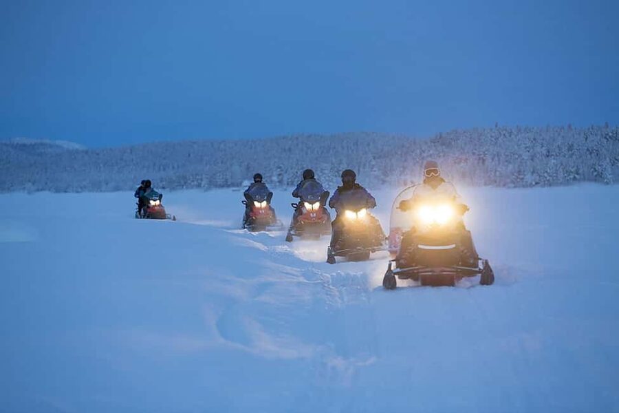 Kiruna: Overnight Snowmobile Tour with Dinner and Sauna - Leaving Kiruna for the Torne River