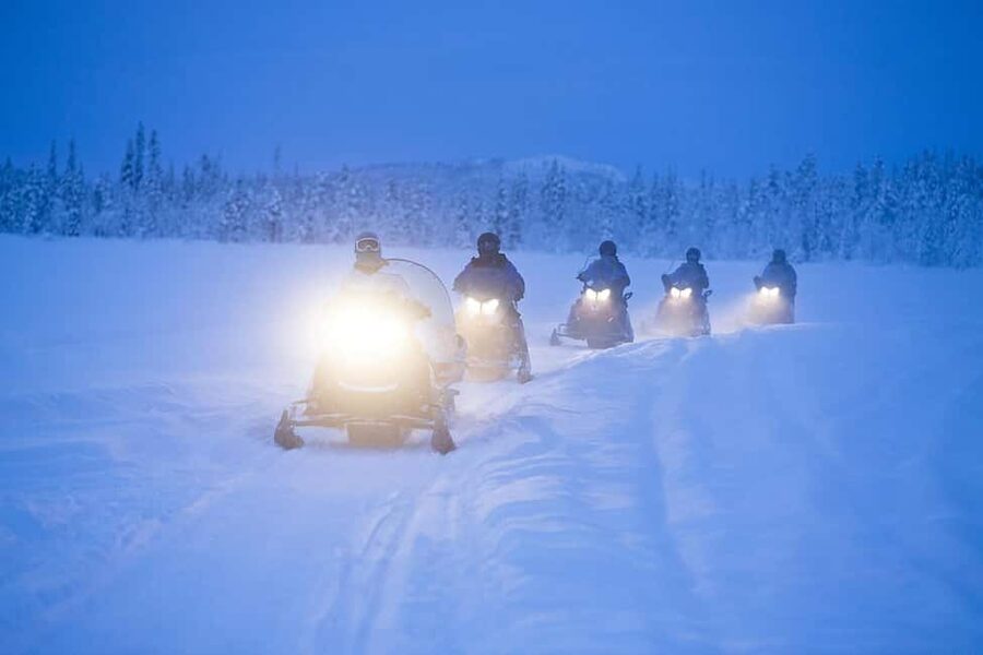 Kiruna: Overnight Snowmobile Tour with Dinner and Sauna - Arriving at the cabin after 20 to 35 kilometers
