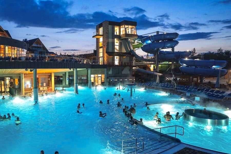 Krakow: Chocholowskie Baths with Ticket and Transportation - Outdoor pools, mountain scenery, and warm air