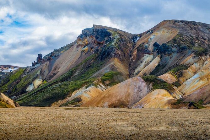 Landmannalaugar Hiking, Haifoss Waterfall and Hot Springs Tour - Bláhylur adds volcanic color and scale