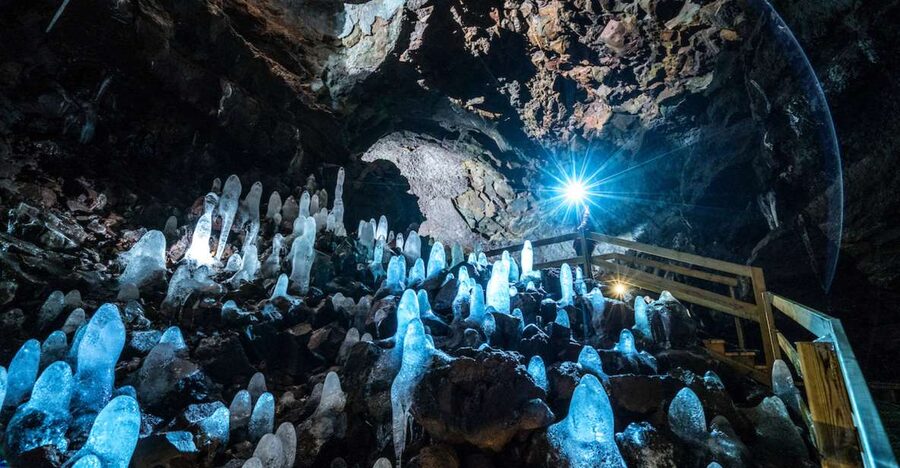 Reykjavik: Lava Cave, Hot Springs, Horses & Waterfalls Tour - Glanni Waterfall and the road into Borgarfjörður
