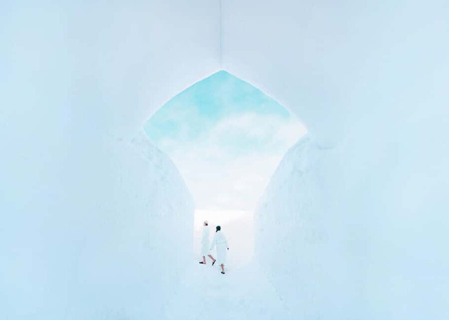 Rovaniemi: Arctic SnowHotel Tour and Snow Sauna Experience - Walking through Arctic SnowHotel