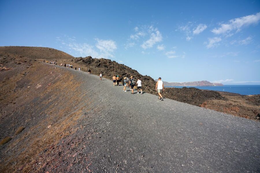 Santorini: Volcanic Islands Cruise with Hot Springs Visit - Thirassia for a second swim and lunch