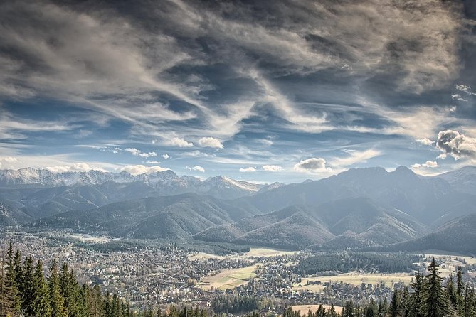 Zakopane Guied Tour: Cable Car, Local Spirits & Thermal Baths - Oscypek, fruit spirits, and the Podhale table
